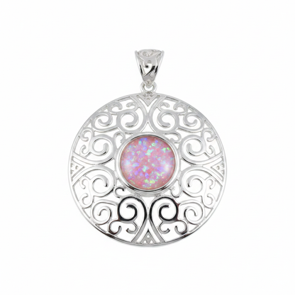 Heavy silver 925 filigree disc memorial pendant with pink opal flakes, white background