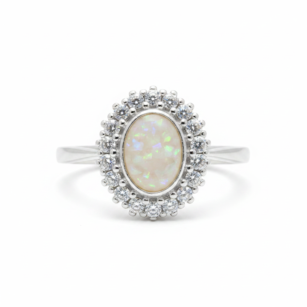 925 sterling silver oval CZ halo memorial ring with white pearl opal and mica shimmer in flat oval resin setting on white background