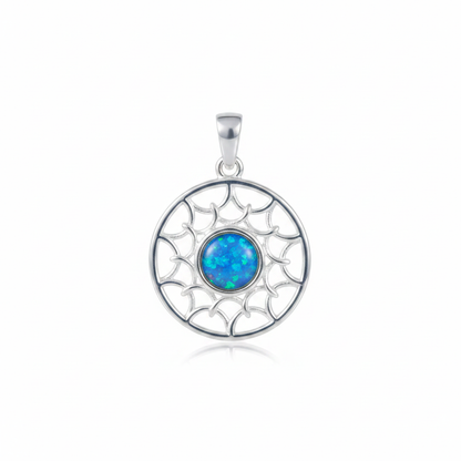 Silver 925 sun scale memorial pendant with blue opal flakes, white background