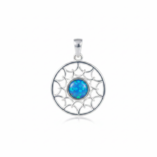 Silver 925 sun scale memorial pendant with blue opal flakes, white background