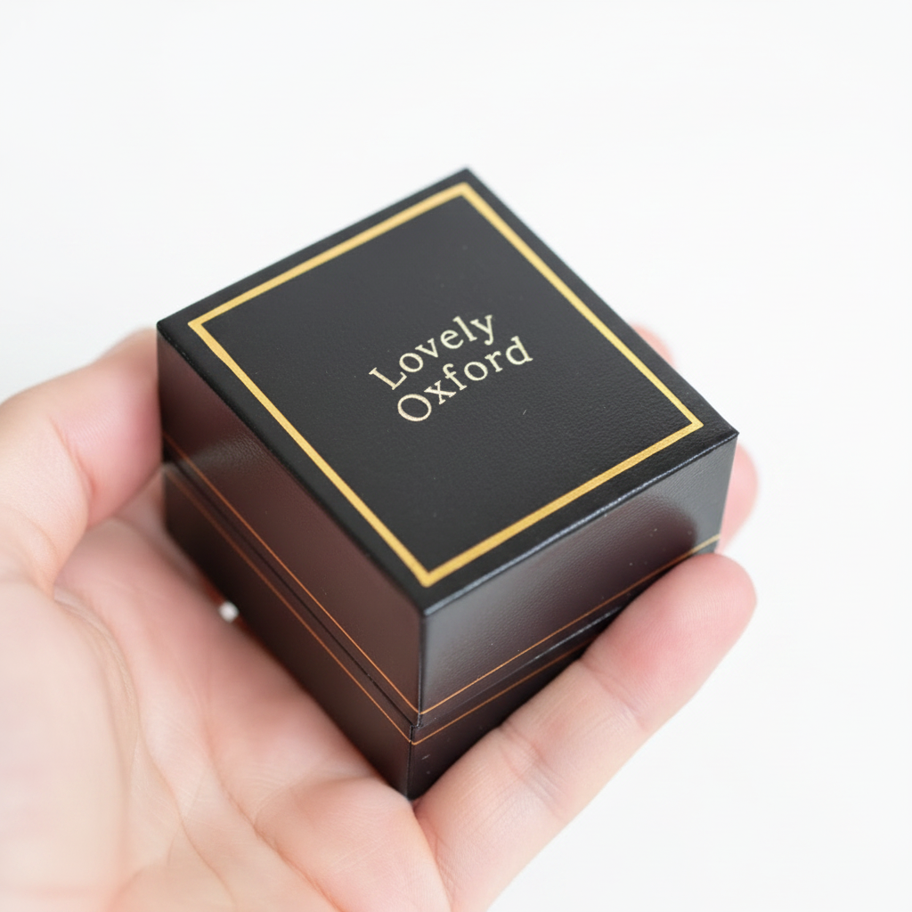 Lovely Oxford branded black gift box with gold border — jewellery gift packaging