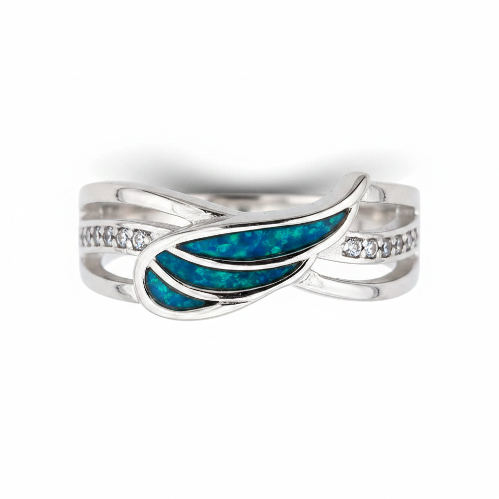 Angel wing CZ 925 silver ring with blue teal opal resin in wing-shaped settings on white background