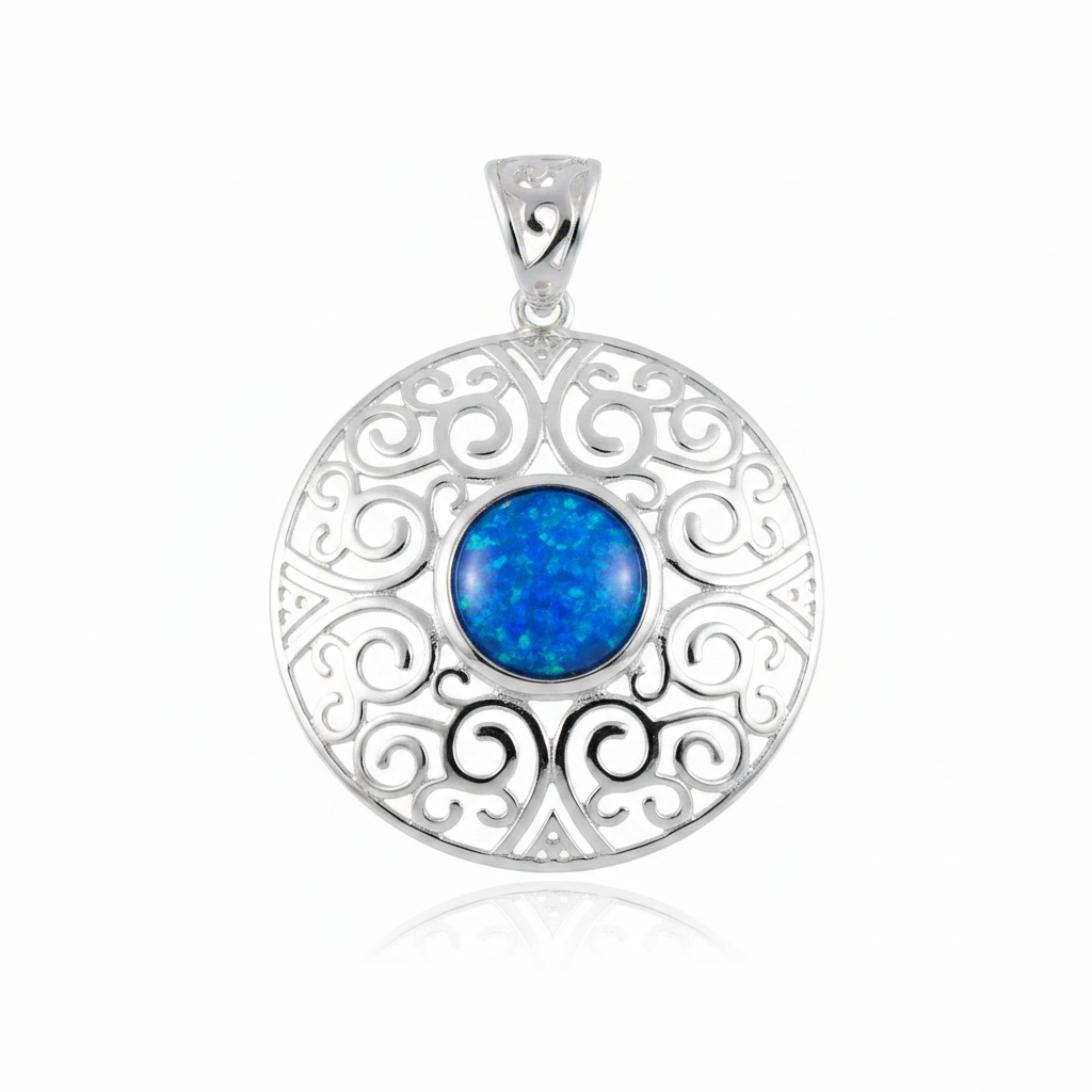 Heavy silver 925 filigree disc memorial pendant with blue opal flakes, white background
