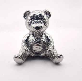 Chrome mirror-polished stainless steel teddy bear memorial ornament front view showing heart-shaped resin recess on tummy