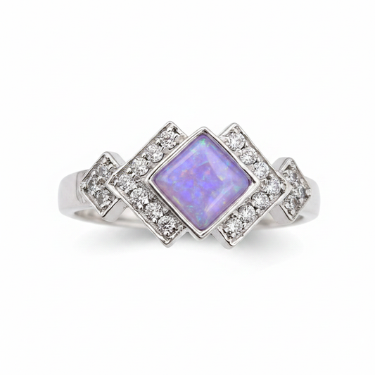Art Deco CZ 925 silver ring with lavender purple opal resin in diamond centre setting on white background