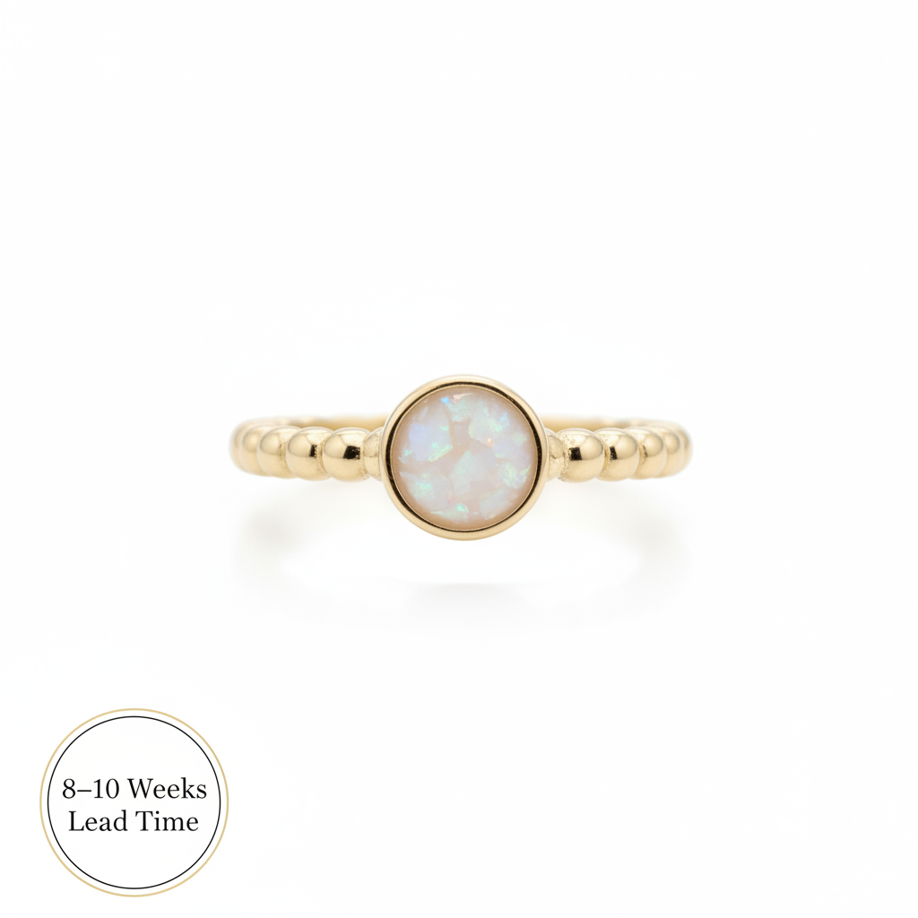 9ct Gold Round Bobble Ring — white pearl opal resin in centre bezel, white background