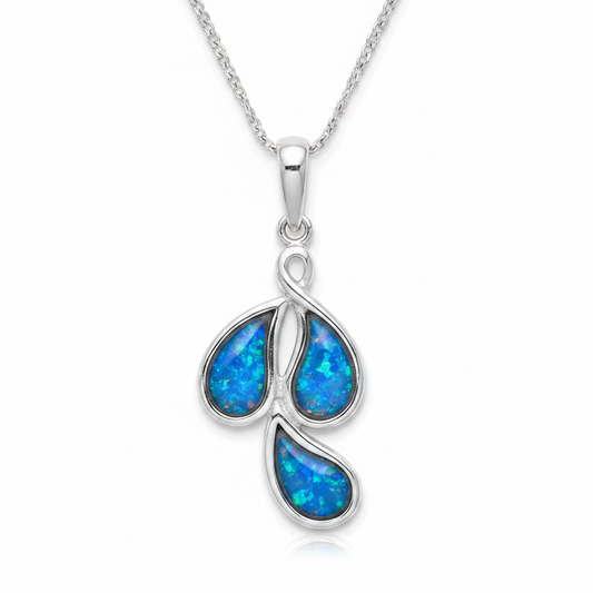Silver 925 triple teardrop cluster memorial pendant with blue opal resin on chain, white background