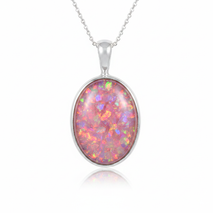 Plain silver 925 oval bezel memorial pendant with pink opal flakes, white background