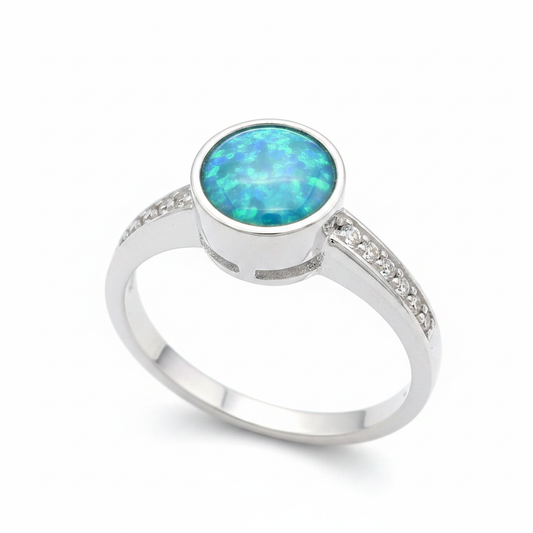 Multi gem round 6mm CZ 925 silver ring with blue teal opal resin side angle view white background