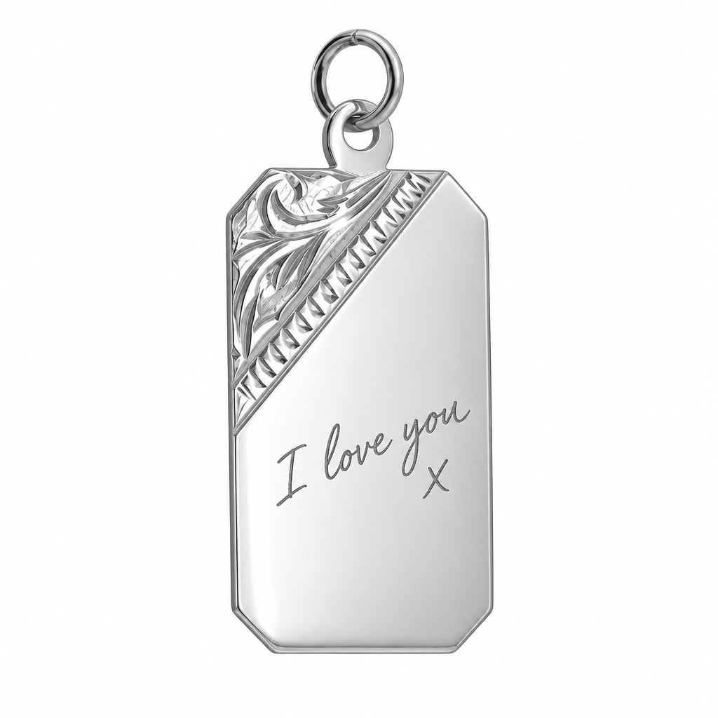 Illustrative handwriting engraving on floral-corner 925 Sterling Silver rectangular pendant alone against white