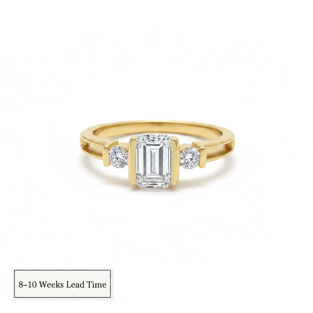 9ct Yellow Gold Emerald Cut CZ Shoulder Bezel Ring — pure white background, 8-10 weeks lead time sticker