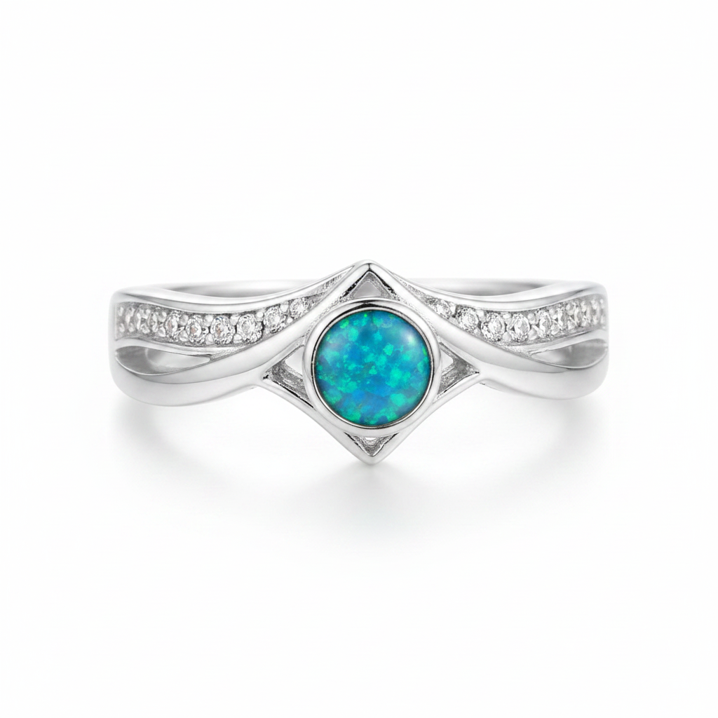 Silver 925 CZ inverted wishbone ring with blue teal opal resin in 4mm central setting on white background