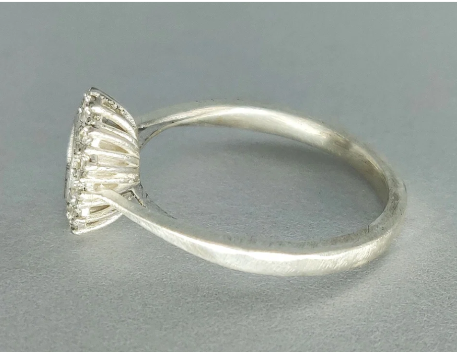 925 sterling silver cushion cut halo memorial ring — side profile showing cathedral shank height and ribbed gallery basket detail