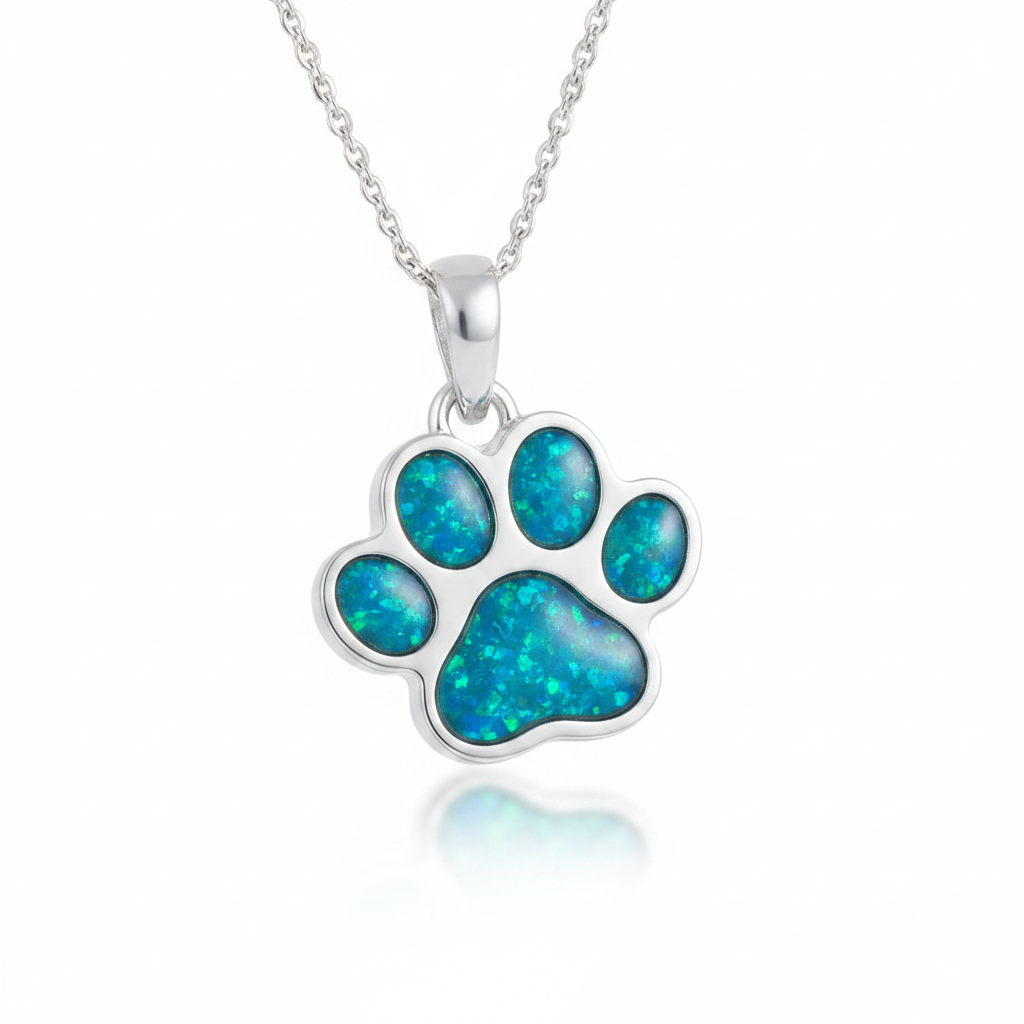 Silver 925 Dog Paw Print Memorial Pendant with blue teal opal resin inclusion — white background