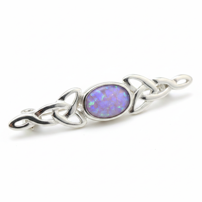 Silver 925 dainty Celtic trinity knot lapel brooch with lavender purple opal resin in 7x5mm central setting on white background