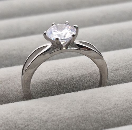 Stainless steel CZ solitaire memorial ring side profile showing split cathedral shank height and six-prong CZ setting
