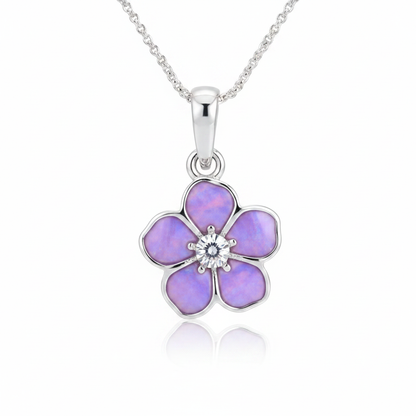 Forget me not silver pendant with lavender purple opal resin glowing in petals and CZ centre, white background