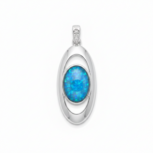 Silver 925 oval orbit memorial pendant with blue opal flakes, white background