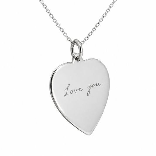 Illustrative personalised handwriting engraved silver heart pendant on fine 0.7 mm silver chain, based on supplied heart photo; sample engraving only