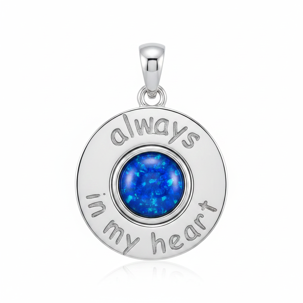 Silver 925 Always In My Heart memorial pendant with blue opal flakes, white background