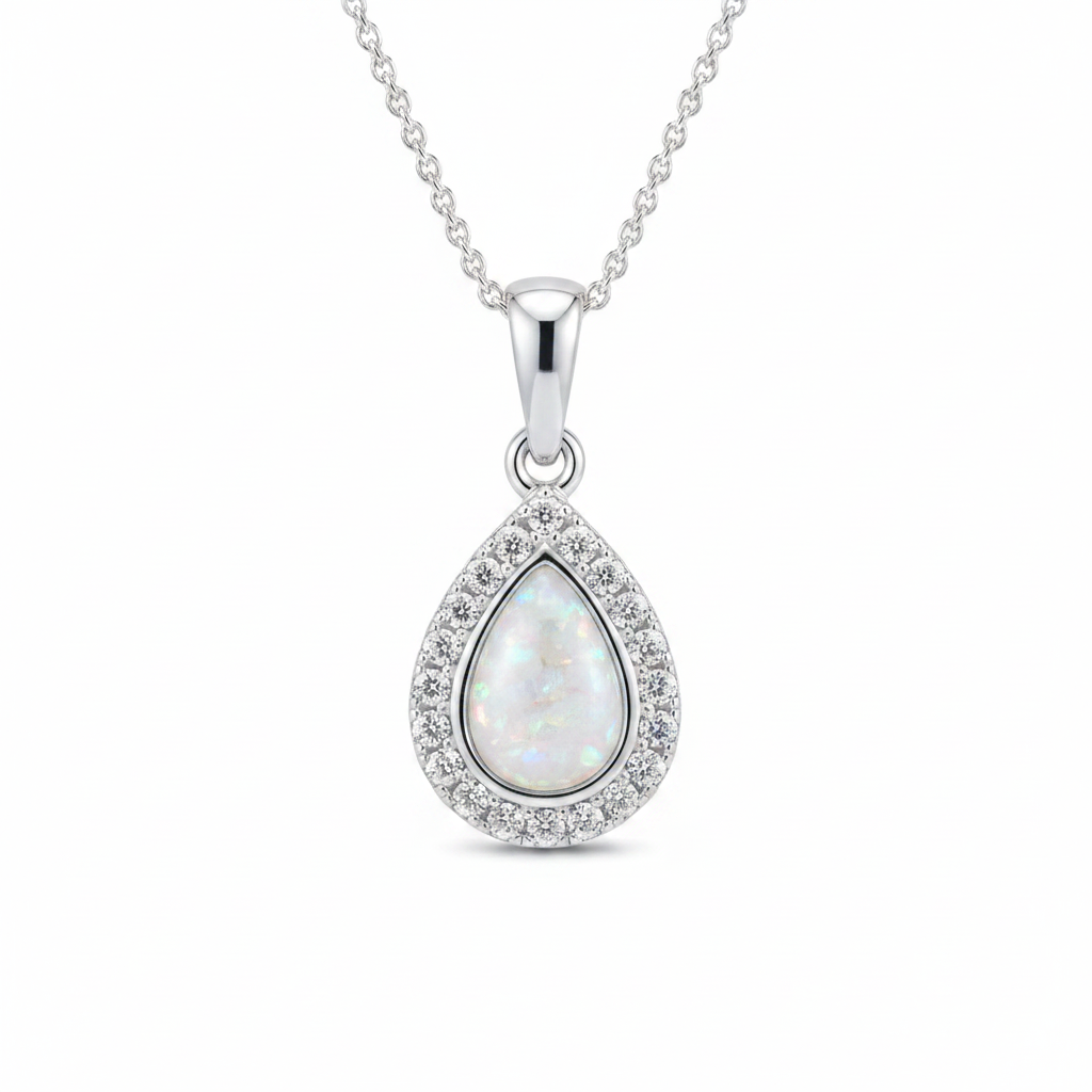 Silver 925 CZ halo teardrop memorial pendant with white opal and mica resin on chain, white background