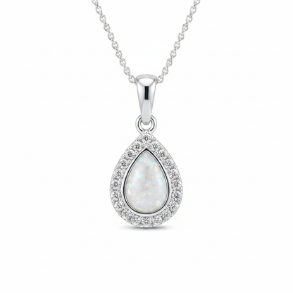 Silver 925 CZ halo teardrop memorial pendant with white opal and mica resin on chain, white background