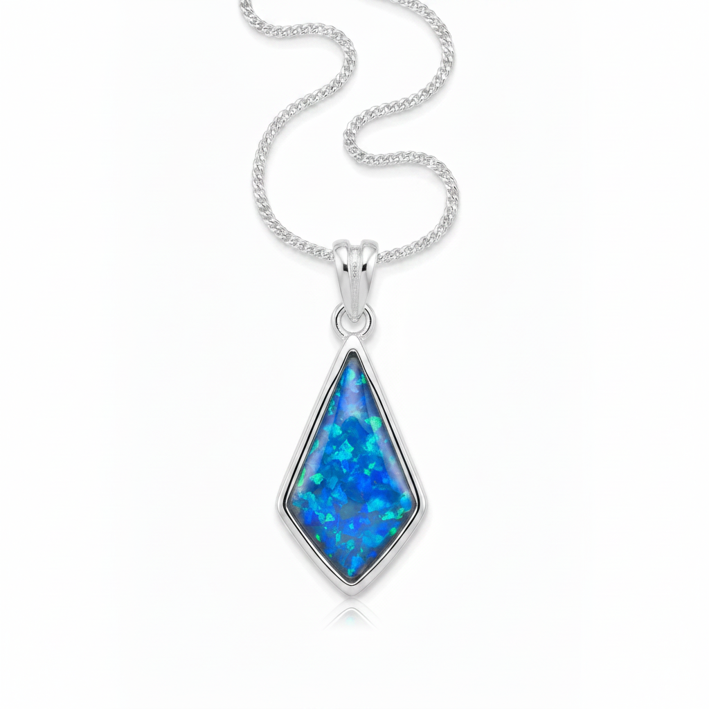 Silver 925 kite shaped memorial pendant with blue opal resin on chain, white background