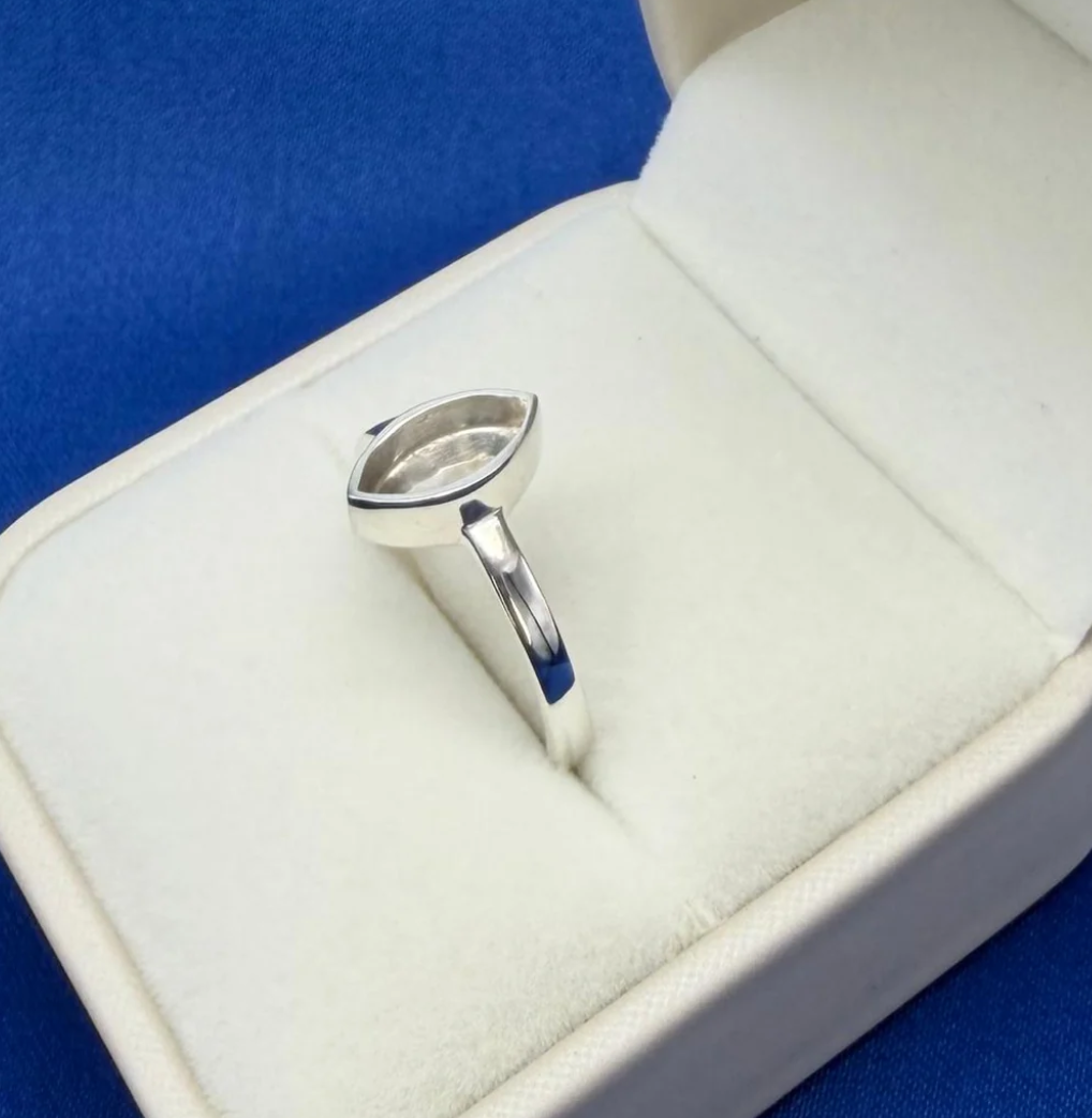 925 sterling silver plain marquise ring side view showing marquise bezel and smooth polished band