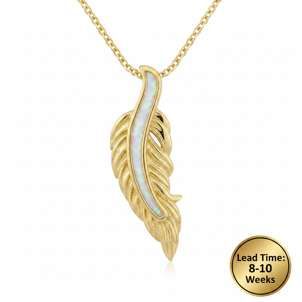 9ct yellow gold feather memorial pendant with white pearl opal resin in central spine, white background, lead time 8-10 weeks