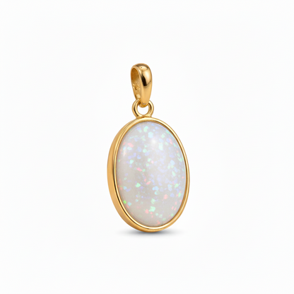 Gold oval memorial pendant with turquoise opal flakes