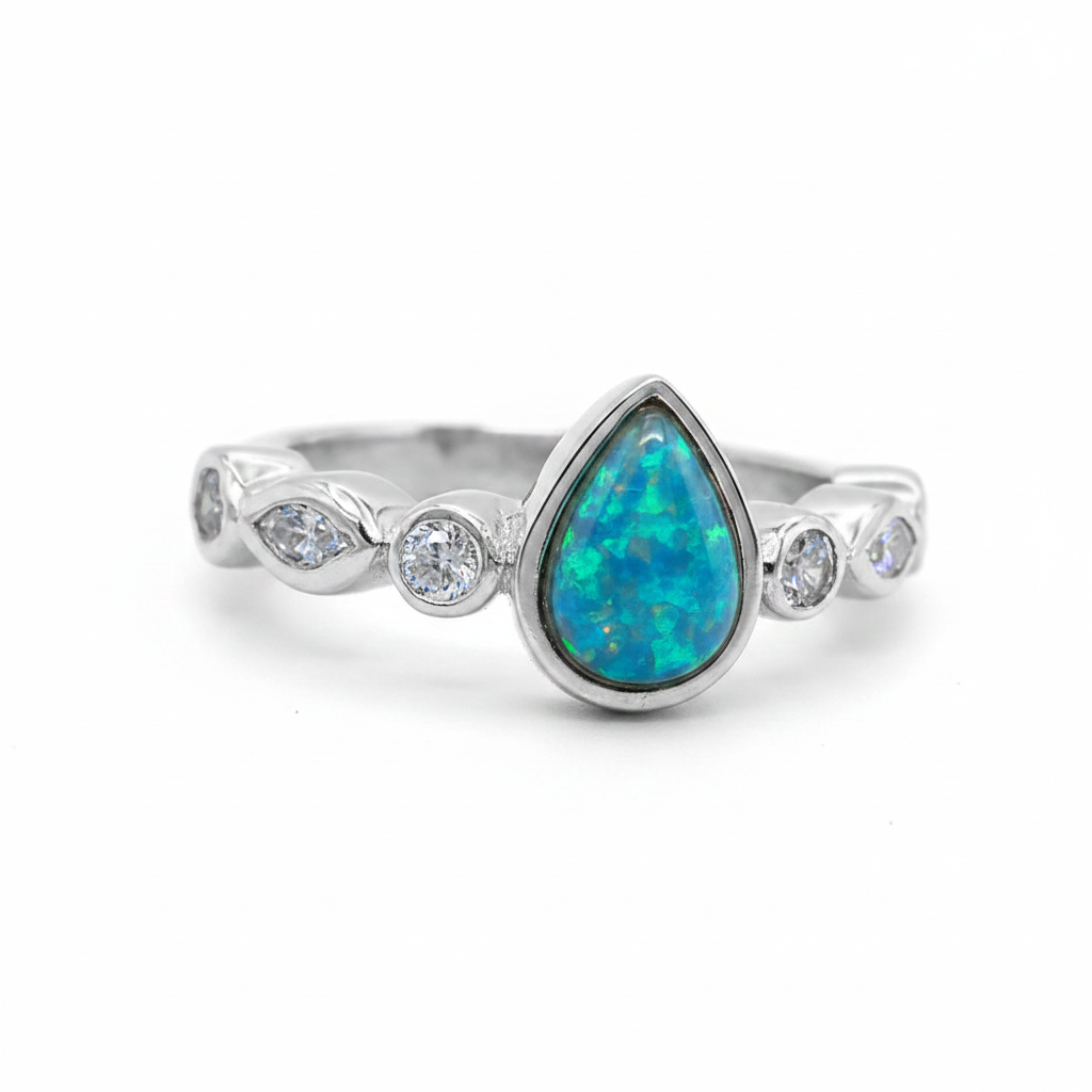Pear marquise shank CZ 925 silver ring with blue teal opal resin 3/4 angle view white background