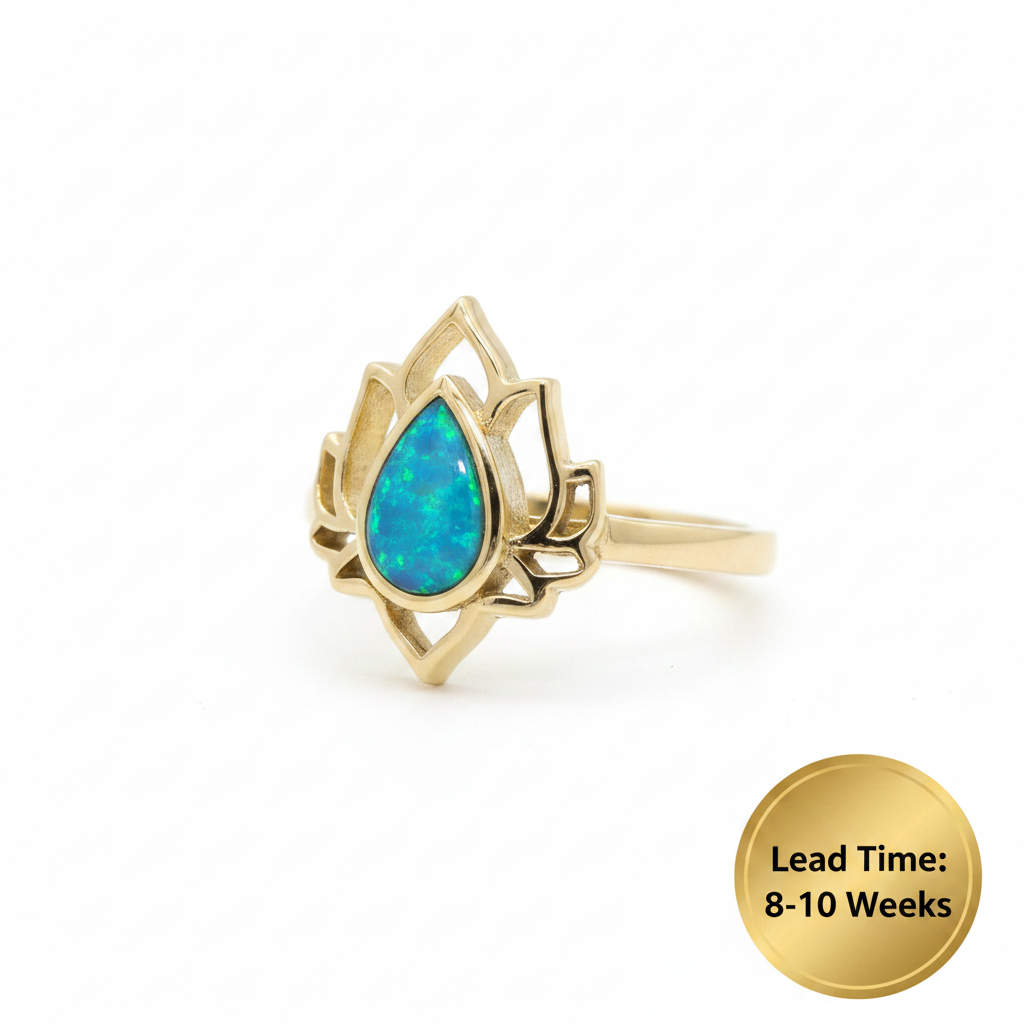 9ct yellow gold lotus bezel memorial ring with blue teal opal resin, white background, lead time 8-10 weeks