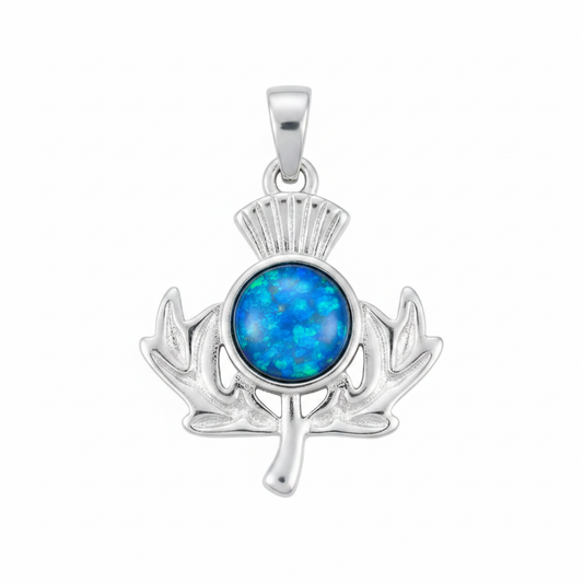 Silver 925 Scottish thistle memorial pendant with blue opal flakes, white background