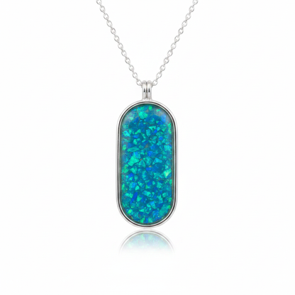 925 sterling silver oval dog tag memorial pendant necklace with blue teal opal resin on white background