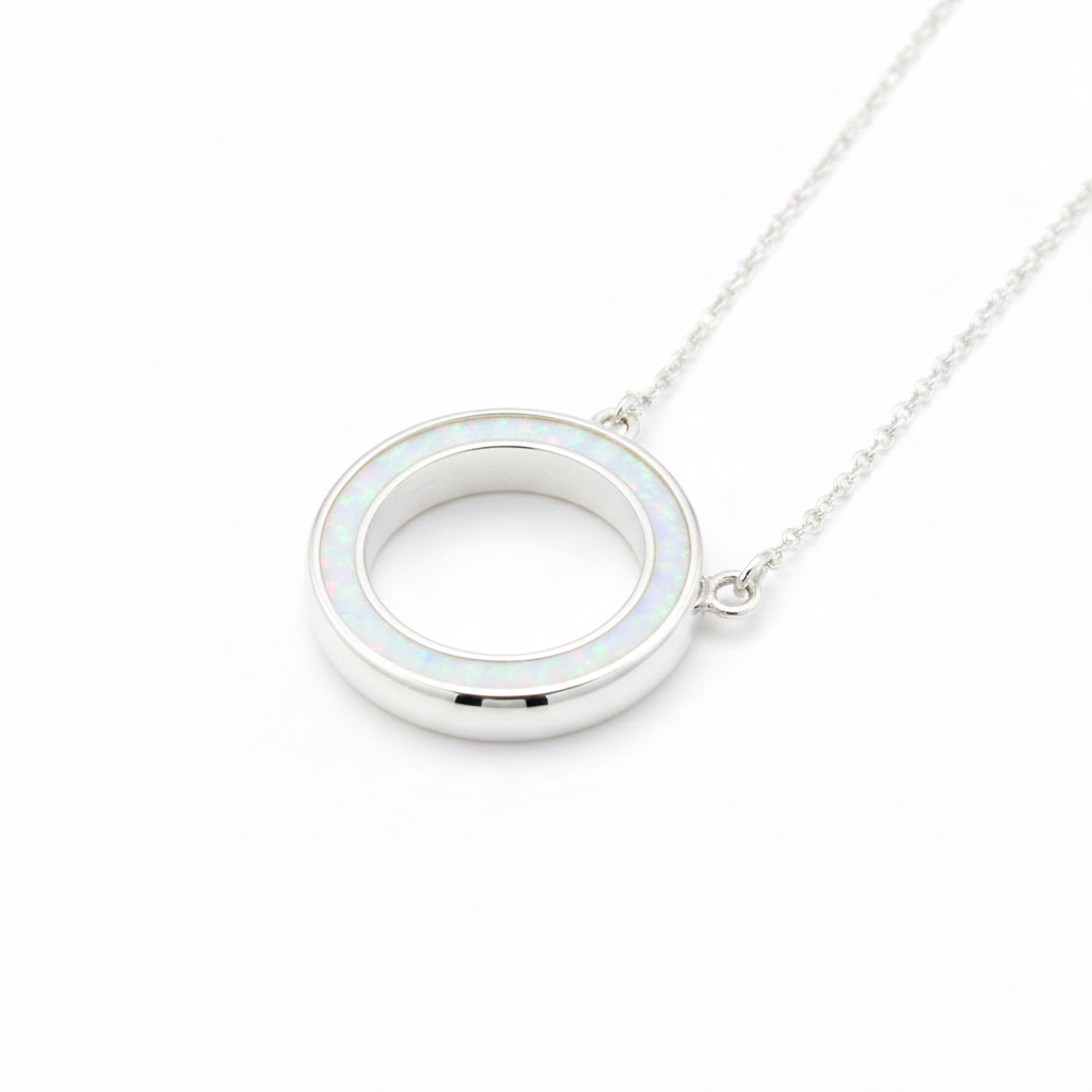 Silver 925 Circle of Life memorial pendant with white opal and mica resin on chain, white background