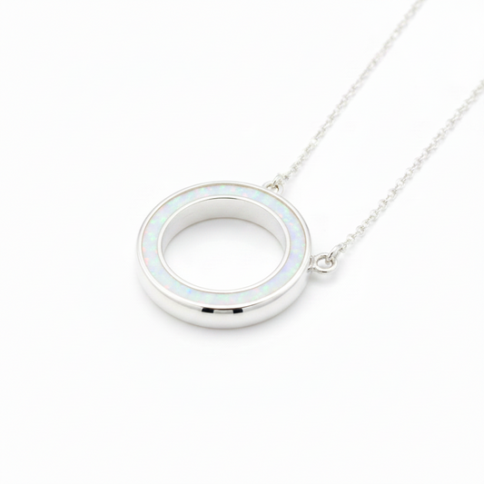 Silver 925 Circle of Life memorial pendant with white opal and mica resin on chain, white background