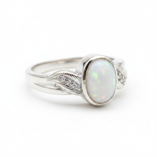 Silver 925 feather shoulder memorial ring — white pearl opal flakes resin in 7x5mm oval centre setting, feather shoulders with CZ stones