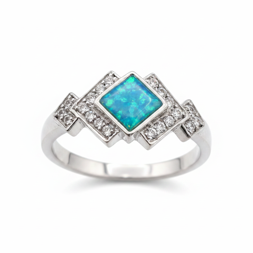 Art Deco CZ 925 silver ring with blue teal opal resin angled front view on white background