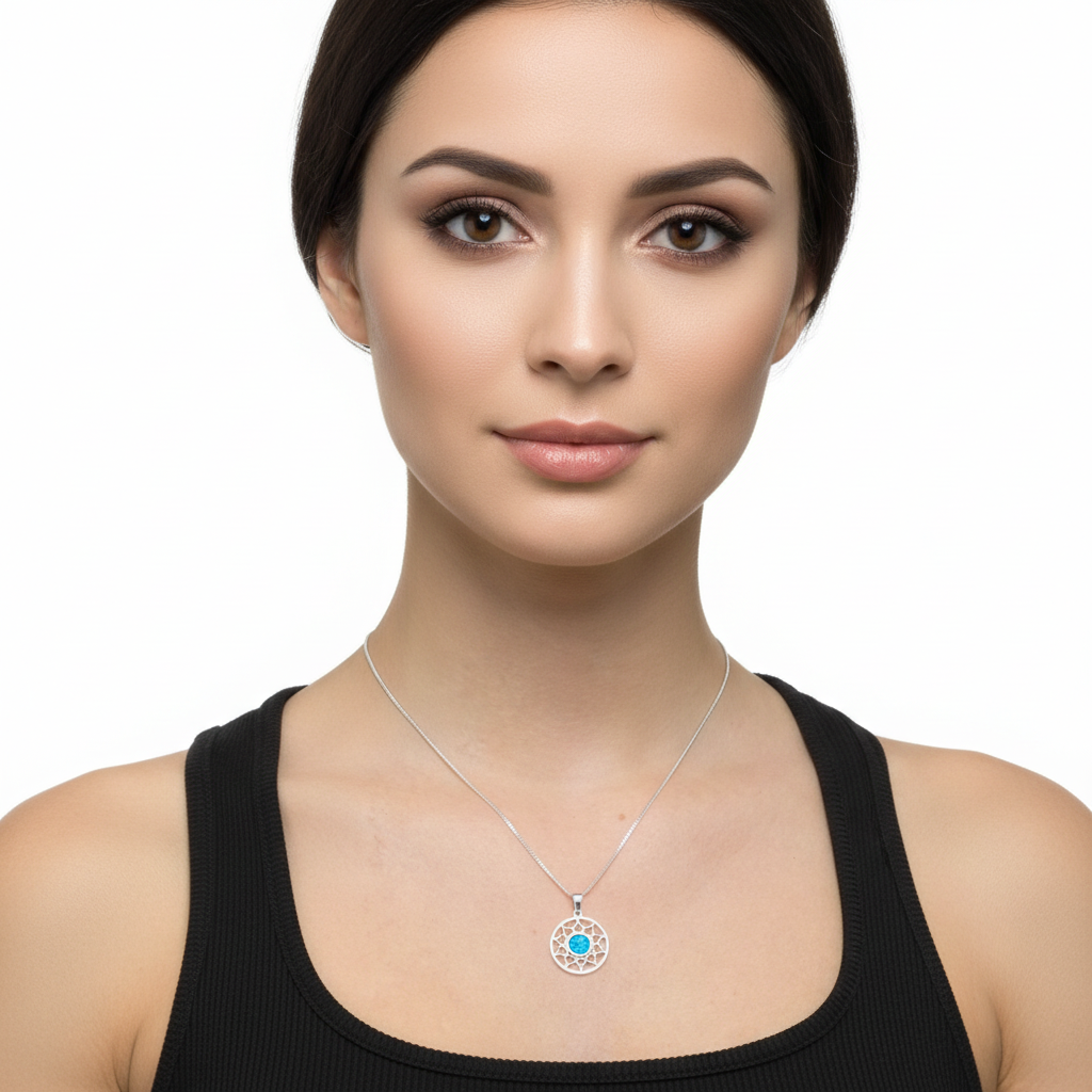 Model wearing silver 925 sun scale memorial pendant at true 16mm scale