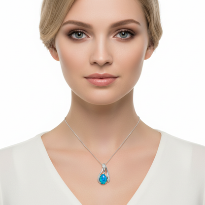 Model wearing silver 925 swirl CZ memorial pendant at true 23x14mm scale