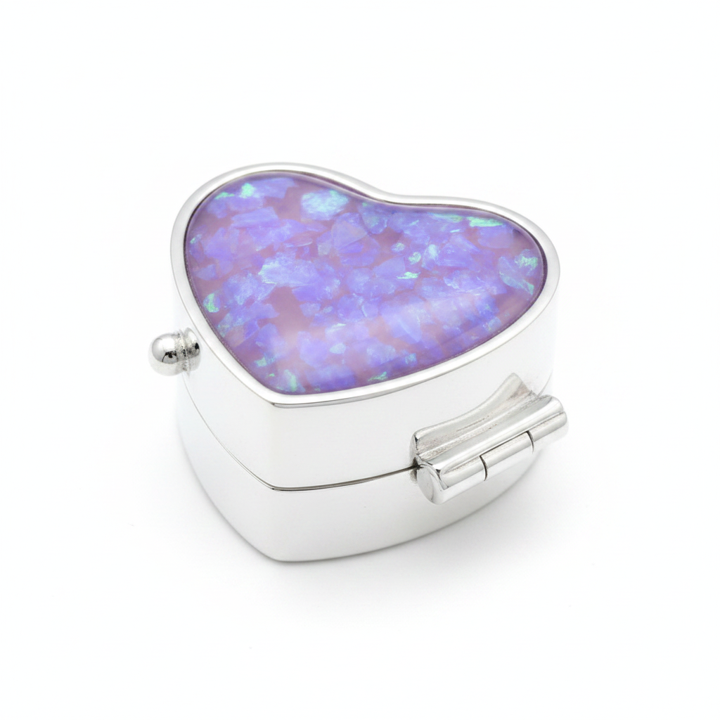 Silver 925 heart pill box with lavender purple opal resin in open heart bezel top on white background