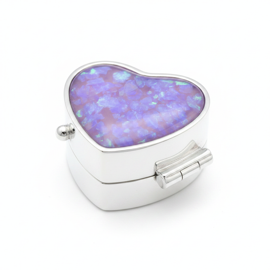Silver 925 heart pill box with lavender purple opal resin in open heart bezel top on white background
