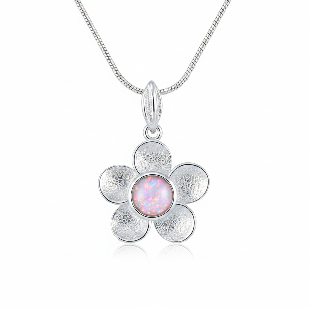 Silver 925 daisy flower memorial pendant with pink opal flakes, white background