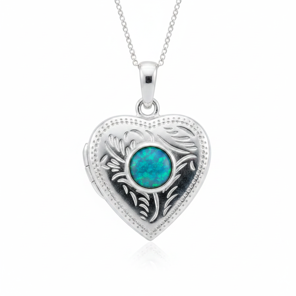 Silver 925 engraved heart locket with blue teal opal resin in 6mm centre setting on white background