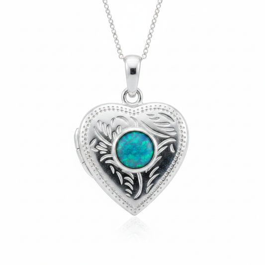 Silver 925 engraved heart locket with blue teal opal resin in 6mm centre setting on white background