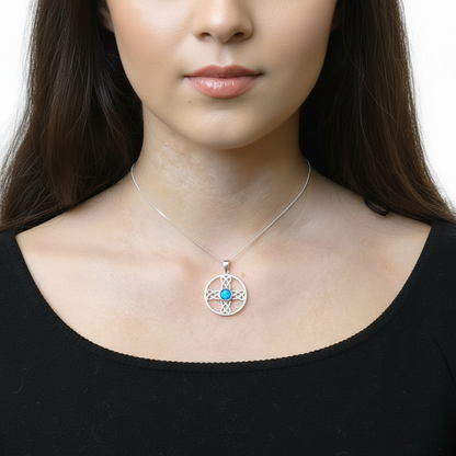 Model wearing silver 925 Celtic cross circle memorial pendant at true 25mm scale