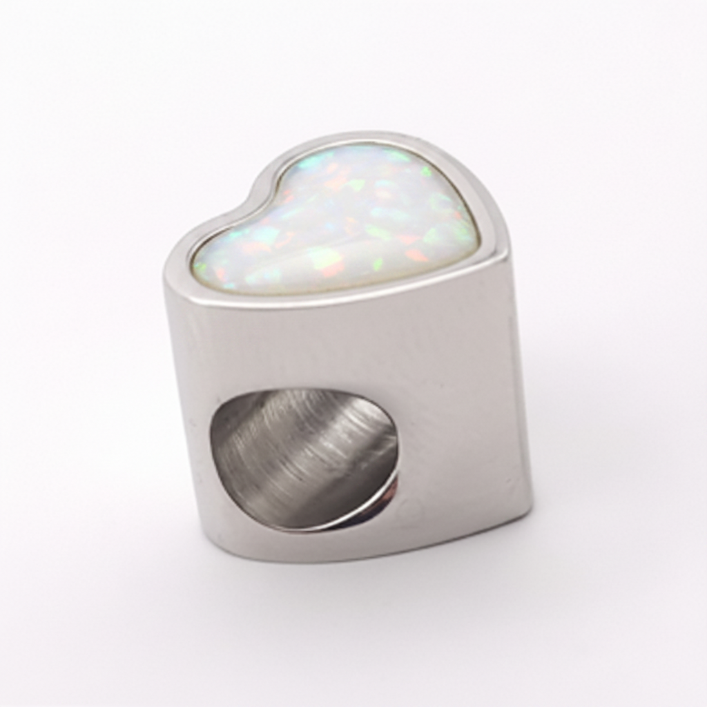 Stainless steel heart charm bead with white pearl opal shimmer resin inclusion on white background