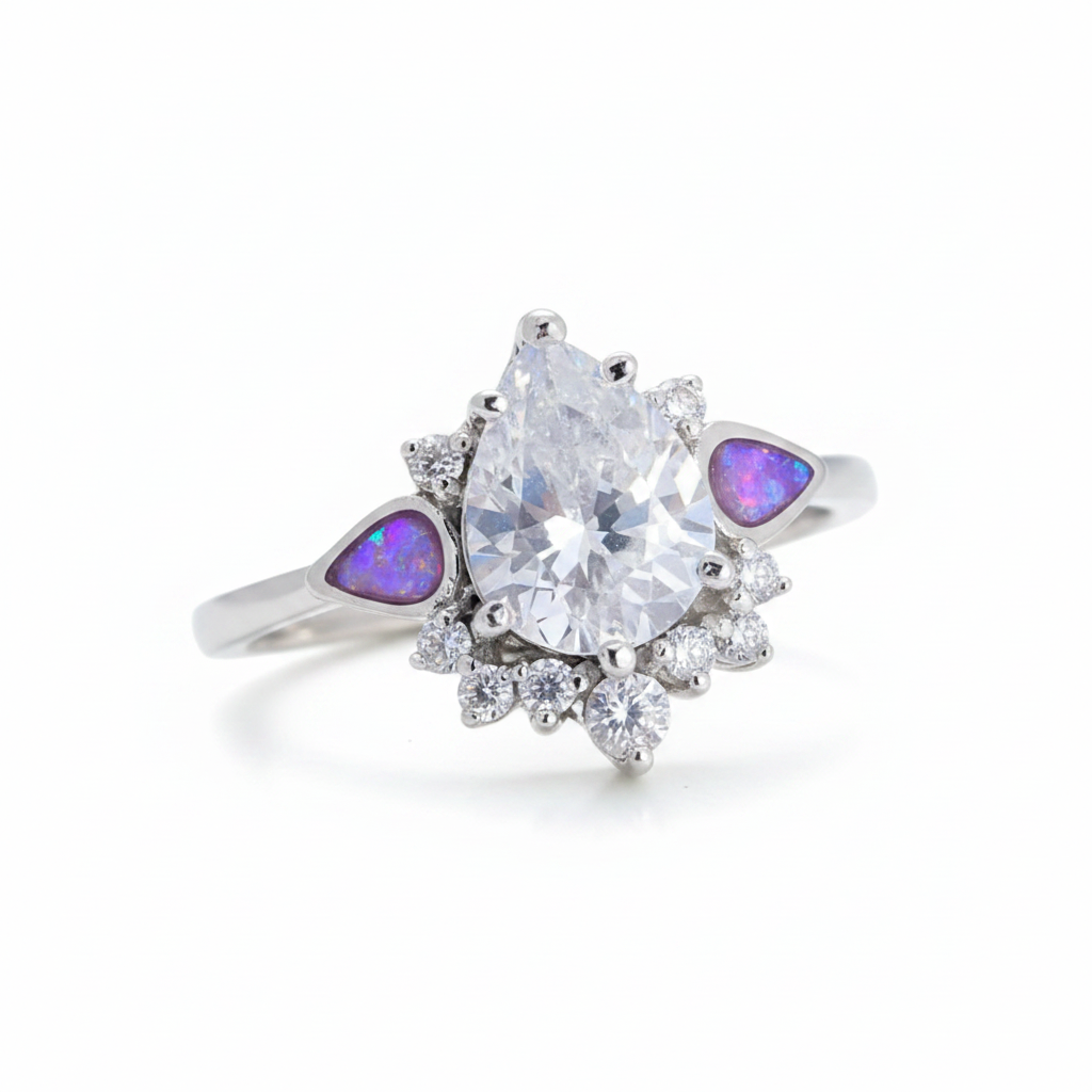 Silver 925 CZ dewdrop cluster ring with lavender purple opal resin in tapered shoulder channels on white background