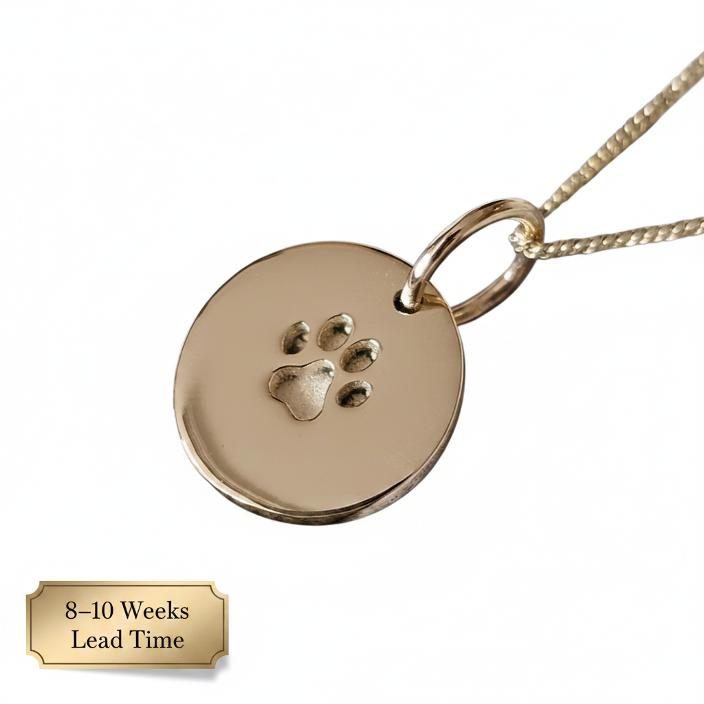 9ct Gold Round Paw Print Disc Pendant — white background, 8-10 weeks lead time sticker