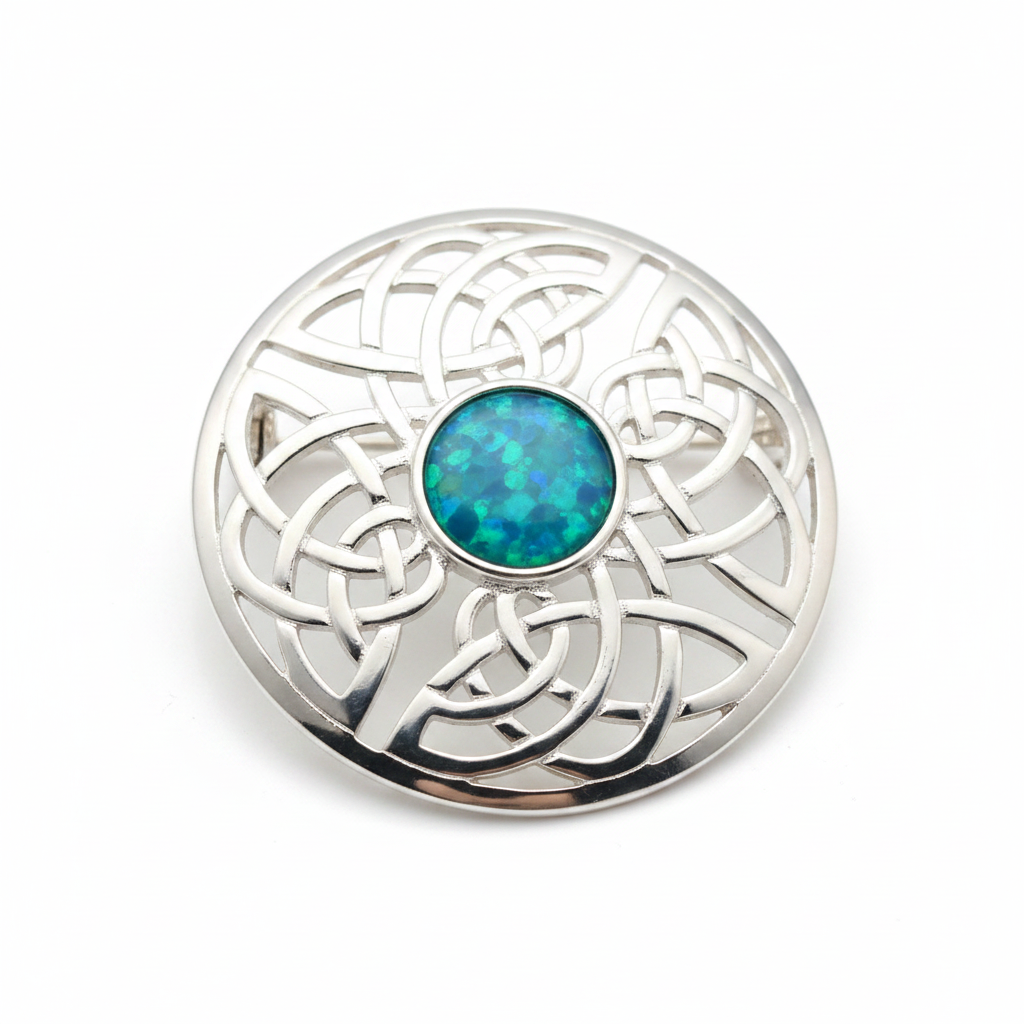 Silver 925 Celtic knot round brooch with blue teal opal resin in 8mm central setting on white background